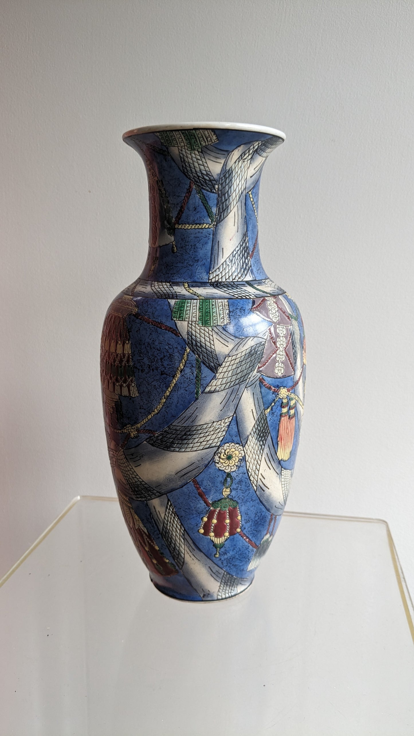Vase Covered in Tassels and Swag