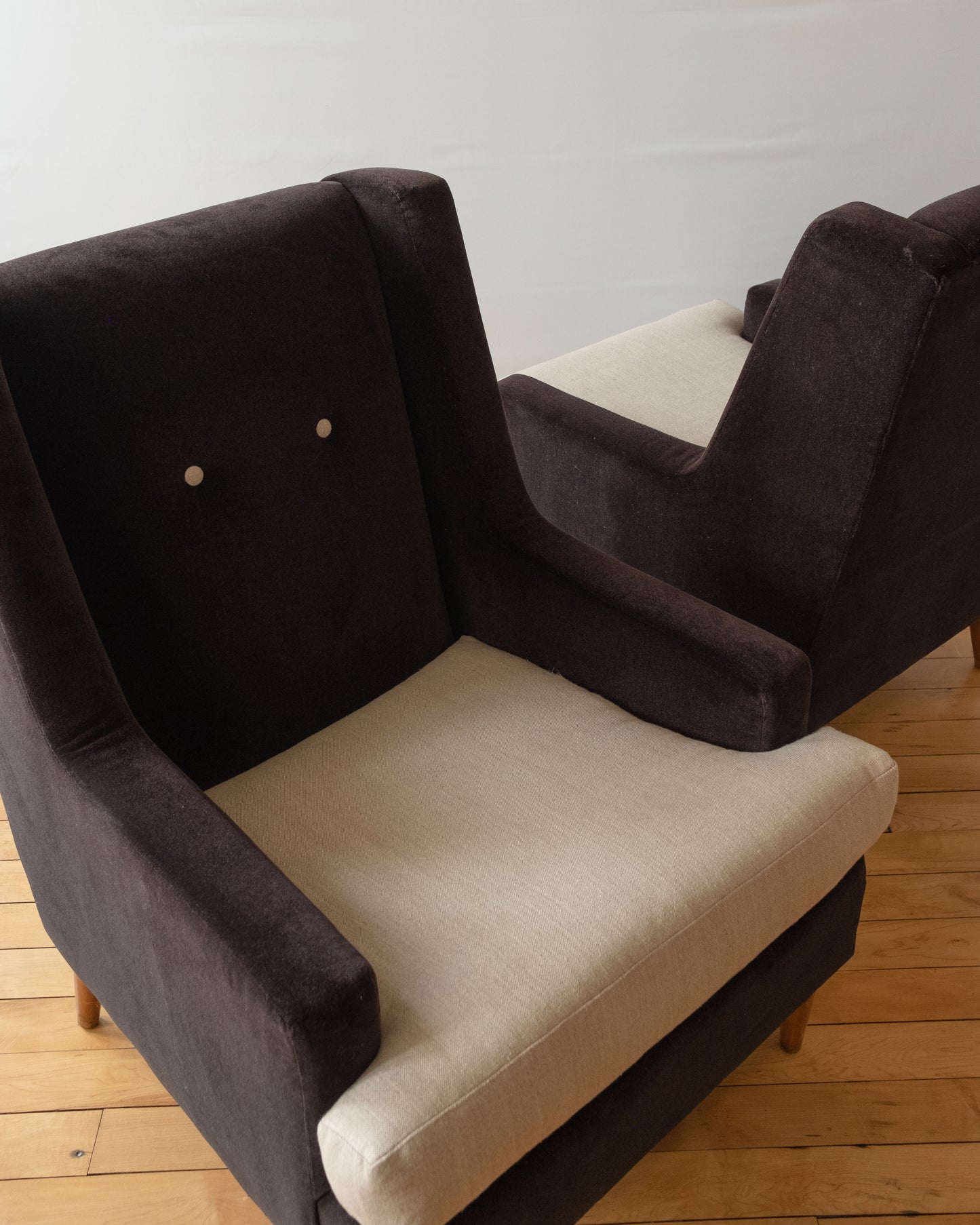 Pair of Mid-Century Black Mohair Tuxedo Armchairs with Tan Linen Seats