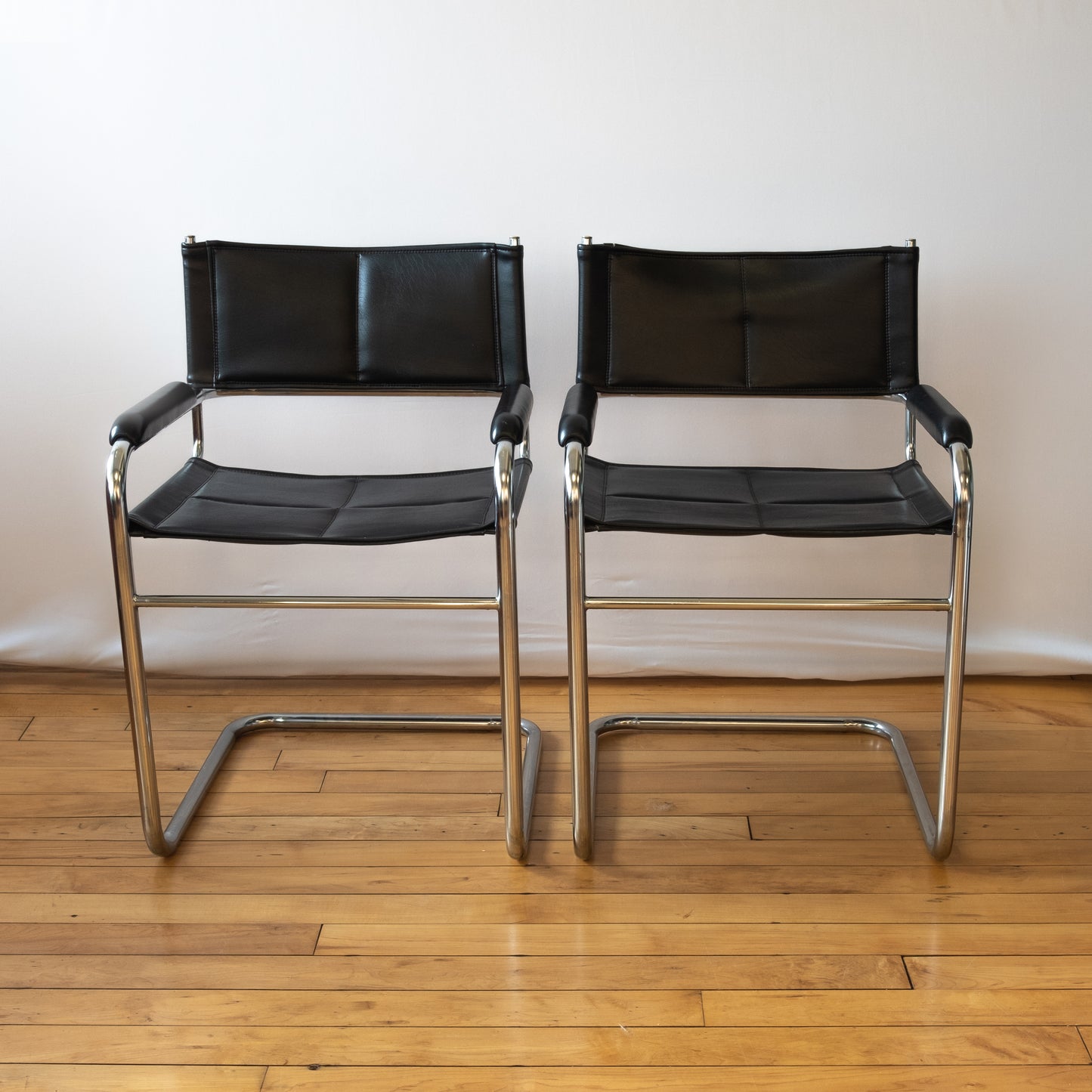 Black Leather & Chrome Cantilevered Chair Pair in style of Marcel Breuer