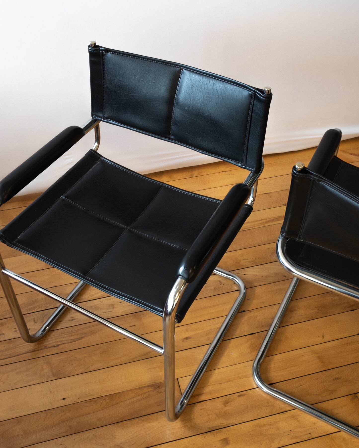 Black Leather & Chrome Cantilevered Chair Pair in style of Marcel Breuer