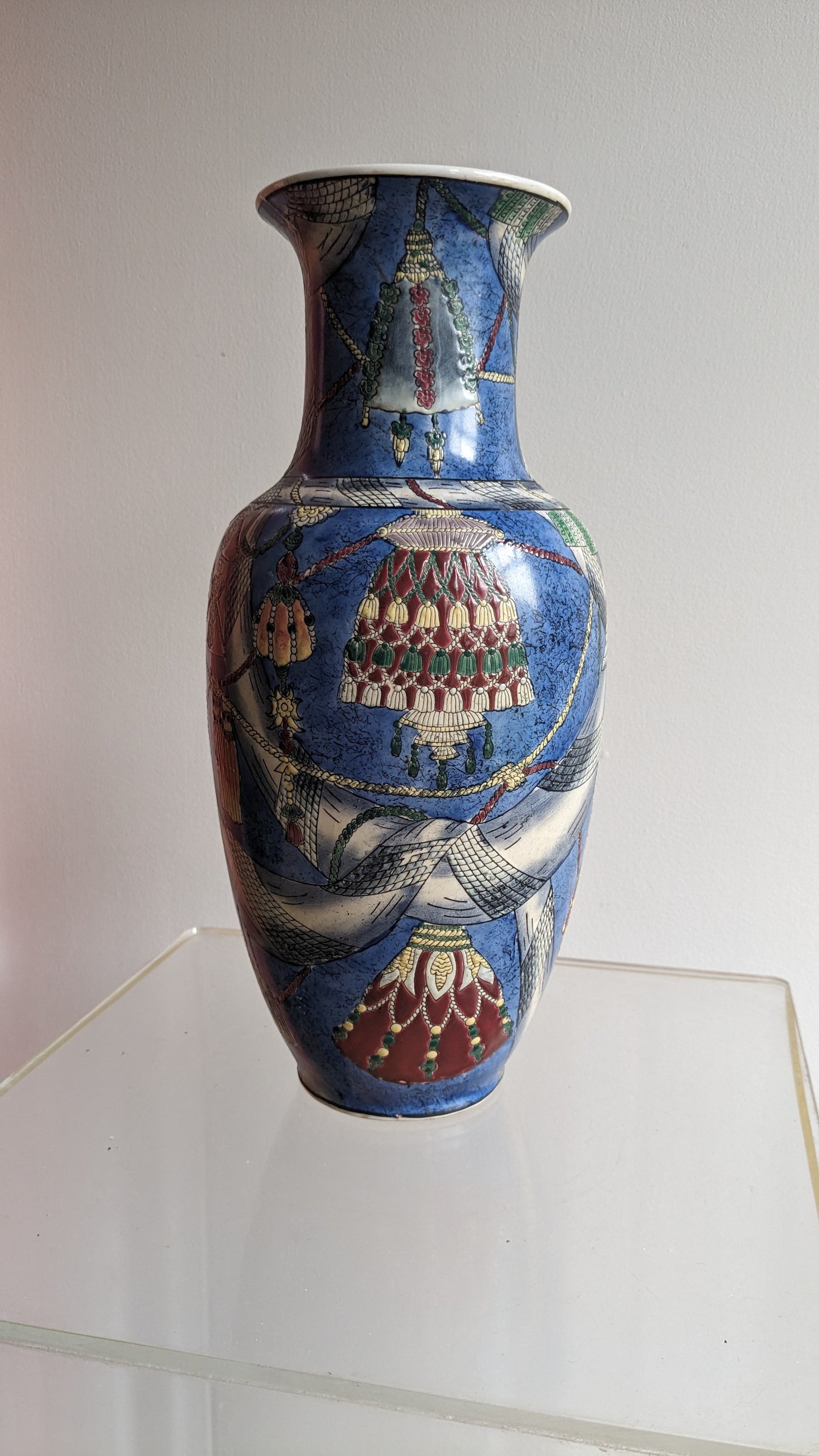Vase Covered in Tassels and Swag